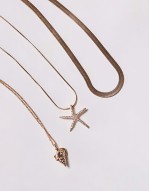 seacharm multirow necklace with starfish pendant in gold